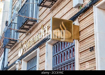 Huelva, Spain - August 16, 2020: A branch of Banco Santander in the village of Valverde del Camino. It is largest bank in the eurozone and one of the Stock Photo