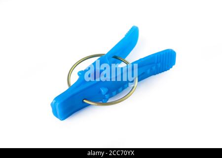 Blue plastic clothespin isolated on white background Stock Photo