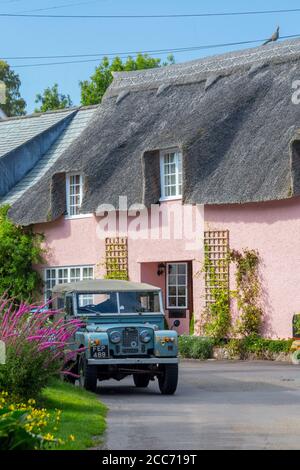 Thatched cottage in Dunster village, Exmoor National Park, Somerset, England Stock Photo