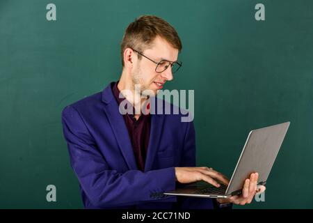 Teacher using modern software self education, preparing for lesson concept. Stock Photo