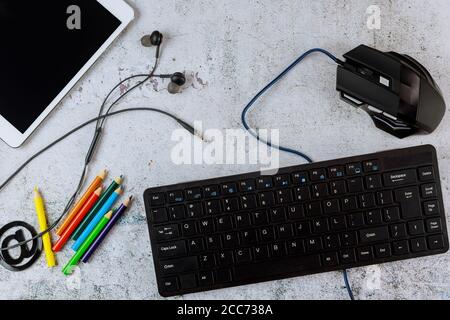 Digital tablet with black mockup screen and keyboard for school education on white background. Stock Photo