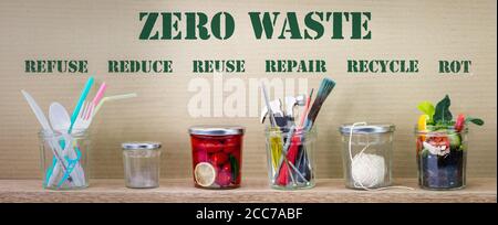 Zero Waste management, illustrated in 6 jars with text Refuse, reduce, recycle, repair, reuse, rot on cardboard background. Sustainable living concept Stock Photo