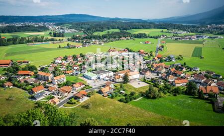 Aerial view of modern Epagny Gruyeres town and rural surroundings in La Gruyere Fribourg Switzerland Stock Photo