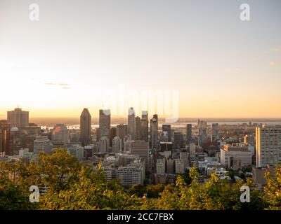 Montreal sunriMontreal sunrise viewed from Mount Royal with city skyline in the morningse viewed from Mount Royal with city skyline in the morning Stock Photo