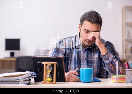 Young student sitting in the classroom Stock Photo
