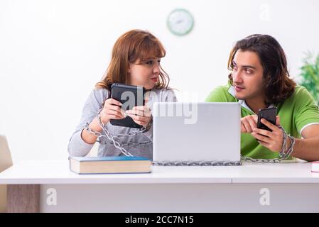 Students in gadget dependency concept Stock Photo