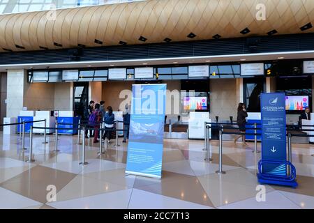 Check-in area of Azerbaijan Airlines flight to London in Baku Airport. Interior view of Heydar Aliyev International Airport in Azerbaijan. Stock Photo