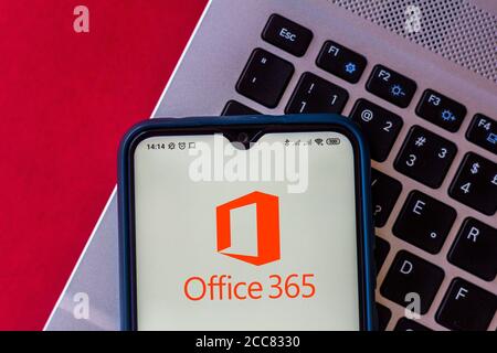 In this photo illustration the Microsoft 365 logo seen displayed on a smartphone. Stock Photo