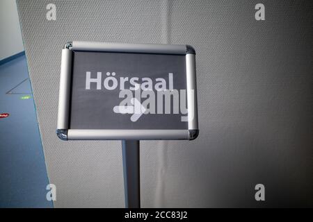 on a grey sign with white letters Lecture hall Stock Photo