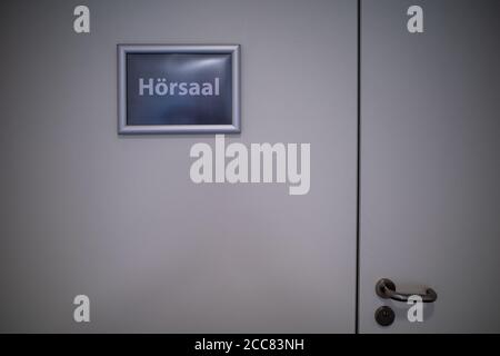 on a grey sign with white letters Lecture hall Stock Photo