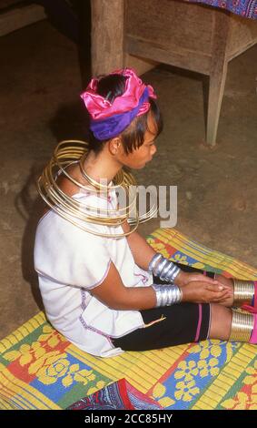 Thailand: A Padaung (Long Neck Karen) woman after removing her neck rings  for cleaning, village near Mae Hong Son. The Padaung or Kayan Lahwi or Long  Necked Karen are a subgroup of