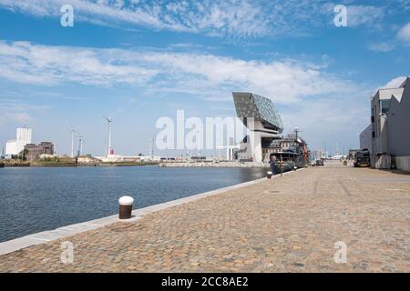 Antwerp, Belgium, July 19, 2020, The quay of the Kattendijkdok with a view of the Port of Antwerp Stock Photo