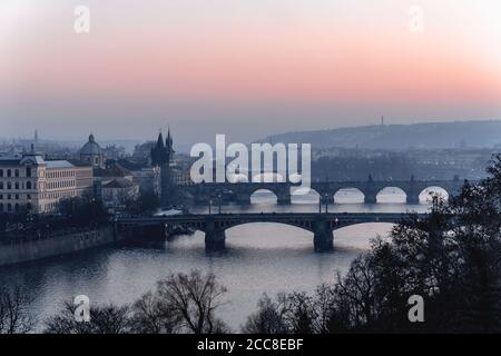 Sunset view of River Vltava, Charles Bridge and Prague Castle in Czech Republic Stock Photo