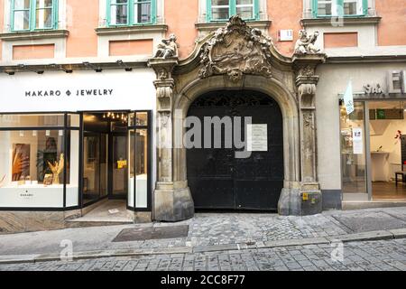 Graz, Austria. August 2020. a typical recorated old wooden door in a building in the city center Stock Photo