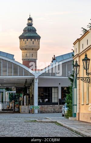 Pilsen, Czech Republic - August 8, 2020: View of the historic Pilsner Urquell brewery buildings. The picture was taken at sunset. Stock Photo