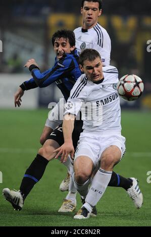 Milan Italy , 24 February 2010, 'G.MEAZZA SAN SIRO ' Stadium,  UEFA Champions League 2009/2010, FC Inter - FC Chelsea: Ivanovic, Milito and Ballack in action  during the Match Stock Photo
