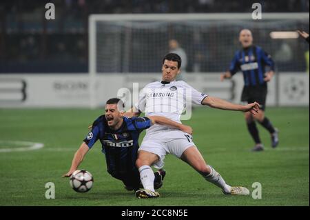 Milan Italy , 24 February 2010, 'G.MEAZZA SAN SIRO ' Stadium,  UEFA Champions League 2009/2010, FC Inter - FC Chelsea: Thiago Motta and Michael Ballack in action  during the Match Stock Photo