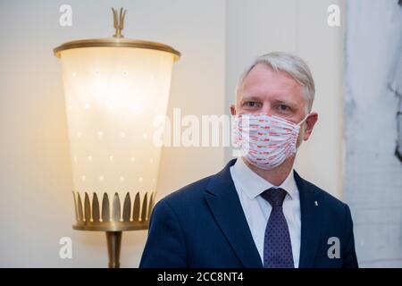 Berlin, Germany. 20th Aug, 2020. Sebastian Scheel (Die Linke), designated senator for urban development of Berlin, is about to hand over his certificate of appointment with a face mask in the Red City Hall. Scheel succeeds the resigned urban development senator Lompscher. Credit: Christoph Soeder/dpa/Alamy Live News Stock Photo