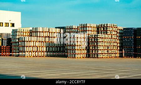 Germany Brewery. Pallets of beer kegs in stock outdoor brewery. Stock Photo