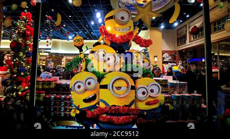 Close up of Christmas version of HAPPY MINION statue in Universal Studios Japan. Minions are famous character from Despicable Me animation. Stock Photo