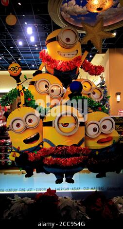 Close up of Christmas version of HAPPY MINION statue in Universal Studios Japan. Minions are famous character from Despicable Me animation. Stock Photo