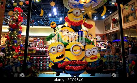 Close up of Christmas version of HAPPY MINION statue in Universal Studios Japan. Minions are famous character from Despicable Me animation. Stock Photo