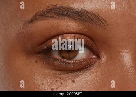 Close-up of African woman with beautiful brown eyes Stock Photo
