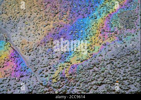 Gasoline flows on the pavement. Stock Photo