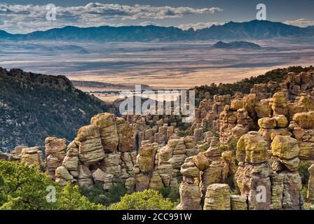 View from Massai Point at Chiricahua National Monument with Sulphur Spring Valley Dragoon Mountains in far distance, Arizona, USA Stock Photo