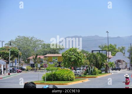 Puerto Vallarta Mexico,19th april 2013,no parking sign on road in mexico , vehicles are parked opposite to the sign ,tourists are enjoying their day d Stock Photo