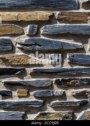 Wall texture using two different natural building materials - Angers, Maine-et-Loire, France. Stock Photo