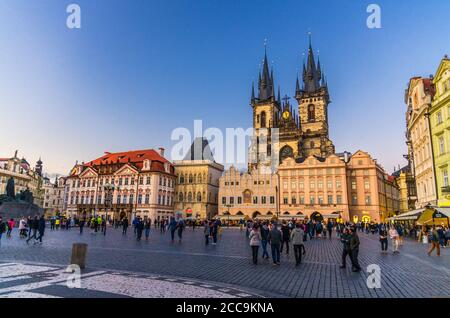 Prague, Czech Republic, May 13, 2019: people are walking down Old Town Square Stare Mesto in historical city centre. Gothic Church of Our Lady before Tyn, evening view, Bohemia Stock Photo