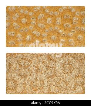 Rye crispbread from the front and back side, close-up from above. Rectangle shaped flat and dry cracker made of rye flour. Light bread. Keeps fresh. Stock Photo