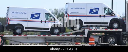 Mount Pleasant, Wisconsin, USA. 20th Aug, 2020. As controversy swirls over the role of the U.S. Postal Service in the 2020 election, new postal vehicles are seen on a flatbed trailer truck in near I - 94 the Village of Mount Pleasant, Wisconsin, near Racine, Thursday August 20, 2020. Credit: Mark Hertzberg/ZUMA Wire/Alamy Live News Stock Photo