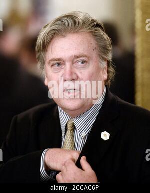 ***FILE PHOTO*** Former Trump Advisor Steve Bannon Arrested And Facing 40 Years In Jail on Fraud Charges. Steve Bannon, President Trump's chief strategist attends a listening session with manufacturing CEOs in the State Dining Room of the White House on February 23, 2017 in Washington, DC. Credit: Olivier Douliery/Pool via CNP /MediaPunch Stock Photo