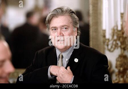 ***FILE PHOTO*** Former Trump Advisor Steve Bannon Arrested And Facing 40 Years In Jail on Fraud Charges. Steve Bannon, President Trump's chief strategist attends a listening session with manufacturing CEOs in the State Dining Room of the White House on February 23, 2017 in Washington, DC. Credit: Olivier Douliery/Pool via CNP /MediaPunch Stock Photo