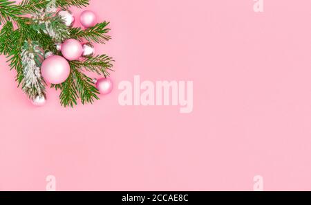Christmas ornaments and decorations on pink background Stock Photo