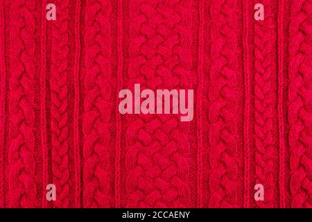 background texture red knitting cable rib pattern Stock Photo