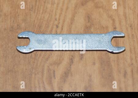 The wrench is widely used by the plumber or by someone who likes to do repairs at home. It is used in the placement of taps and has adjustment, which Stock Photo