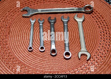 The wrench is widely used by the plumber or by someone who likes to do repairs at home. It is used in the placement of taps and has adjustment, which Stock Photo