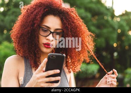 Beautiful Afro American  woman looking at her woman Stock Photo