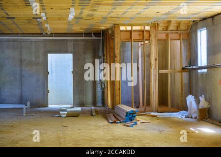 New residential construction home framing with basement unfinished view Stock Photo