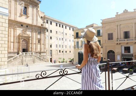 Young tourist woman visiting the old town of Palermo in Sicily, Italy Stock Photo