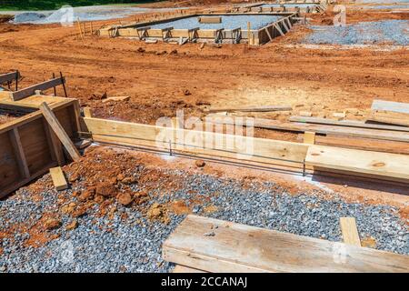 Horizontal shot of wooden molds to be filled with concrete in new construction. Stock Photo