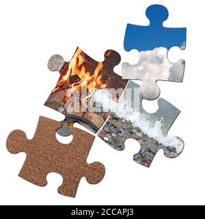 The four elements in a collage made from puzzle pieces Stock Photo