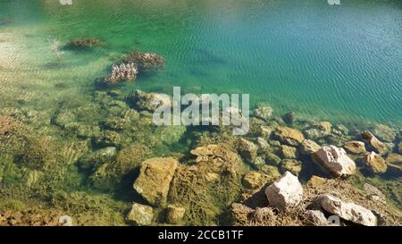 Pond lake situated in lush landscape at Boab Quarry Campsite in Western Australia. Stock Photo