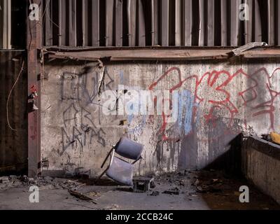 Interior of old abandoned factory warehouse. Stock Photo