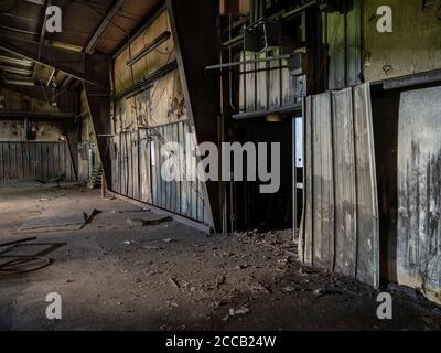 Interior of old abandoned factory warehouse. Stock Photo