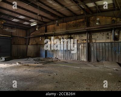 Interior of old abandoned factory warehouse. Stock Photo