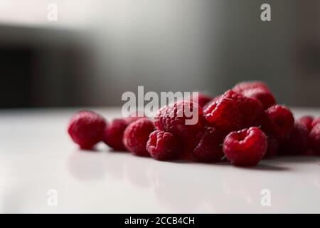 Raspberries on the table, close-up summer natural berries Stock Photo